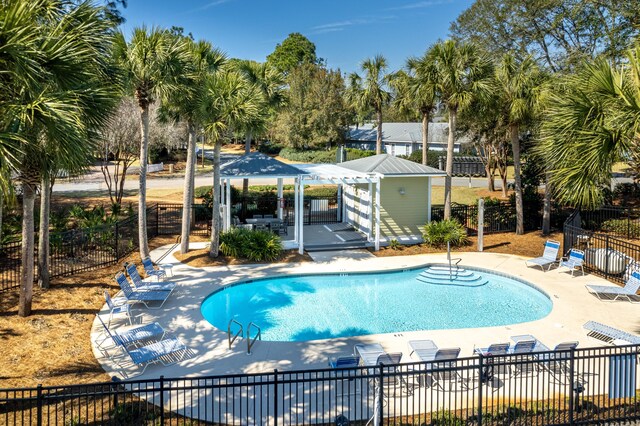 2077 Olde Towne Ave, Miramar Beach, FL 32550 - community pool featuring a gazebo, a patio area, and view of scattered trees