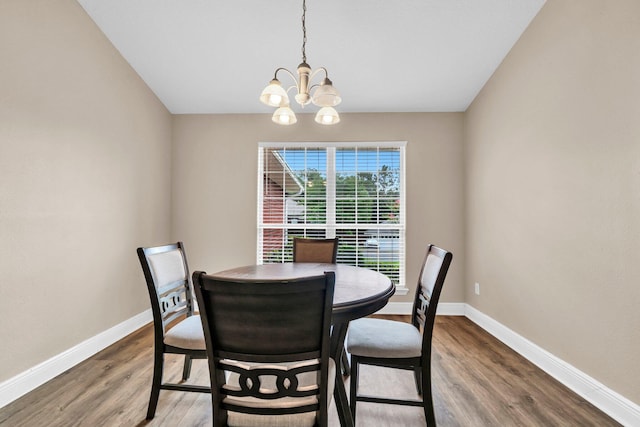 653 Territory Ln, Crestview, FL 32536 - dining space featuring a chandelier and wood finished floors