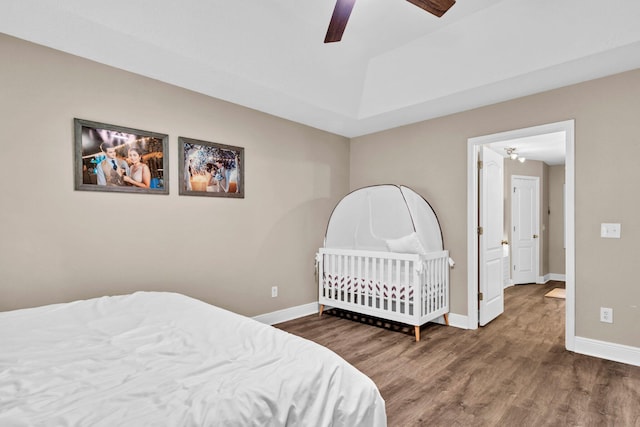 653 Territory Ln, Crestview, FL 32536 - bedroom with wood finished floors and a ceiling fan