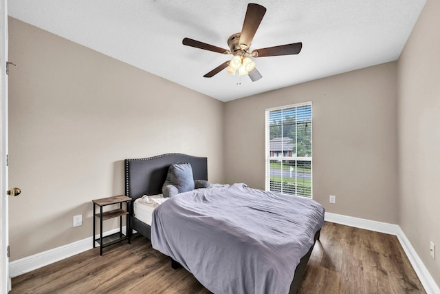 653 Territory Ln, Crestview, FL 32536 - bedroom featuring wood finished floors and a ceiling fan