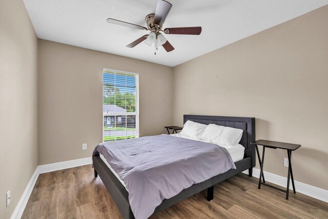 653 Territory Ln, Crestview, FL 32536 - bedroom featuring wood finished floors and ceiling fan