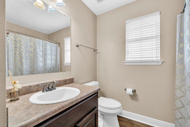 653 Territory Ln, Crestview, FL 32536 - full bathroom featuring vanity and wood finished floors