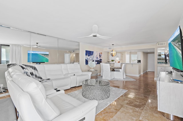 114 Mainsail Dr Unit 143, Miramar Beach, FL 32550 - living area with ceiling fan, healthy amount of natural light, and ornamental molding