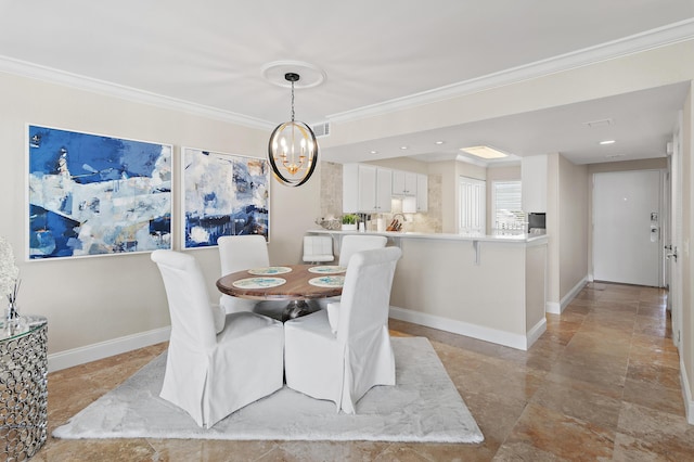 114 Mainsail Dr Unit 143, Miramar Beach, FL 32550 - dining space with crown molding and a chandelier