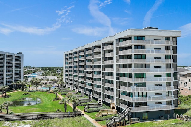 114 Mainsail Dr Unit 143, Miramar Beach, FL 32550 - view of apartment building / complex featuring a water view