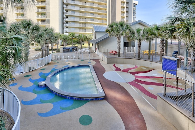 114 Mainsail Dr Unit 143, Miramar Beach, FL 32550 - community pool featuring a patio