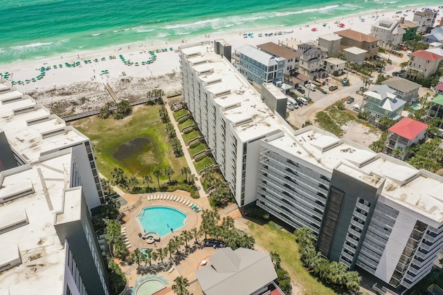 114 Mainsail Dr Unit 143, Miramar Beach, FL 32550 - bird's eye view of waterfront with a beach and a pool area