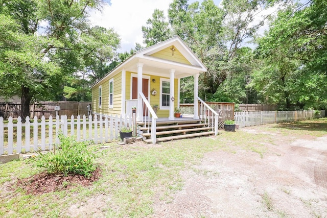 147-161 Caswell Branch Rd, Freeport, FL 32439 - shotgun-style home with covered porch