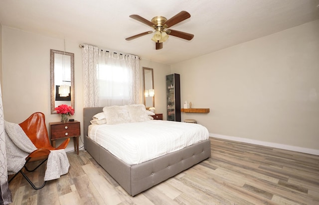 52 NE Iowa Dr, Fort Walton Beach, FL 32548 - bedroom featuring light wood-type flooring and a ceiling fan