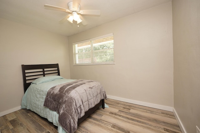 52 NE Iowa Dr, Fort Walton Beach, FL 32548 - bedroom featuring wood finished floors and ceiling fan