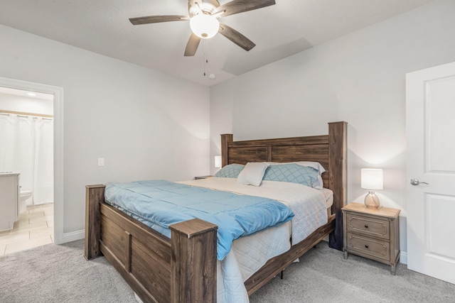 1922 Frontera St, Navarre, FL 32566 - bedroom featuring light colored carpet, ceiling fan, and ensuite bathroom