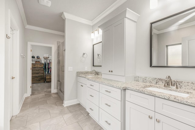 1922 Frontera St, Navarre, FL 32566 - full bathroom with double vanity, a shower stall, a walk in closet, and ornamental molding