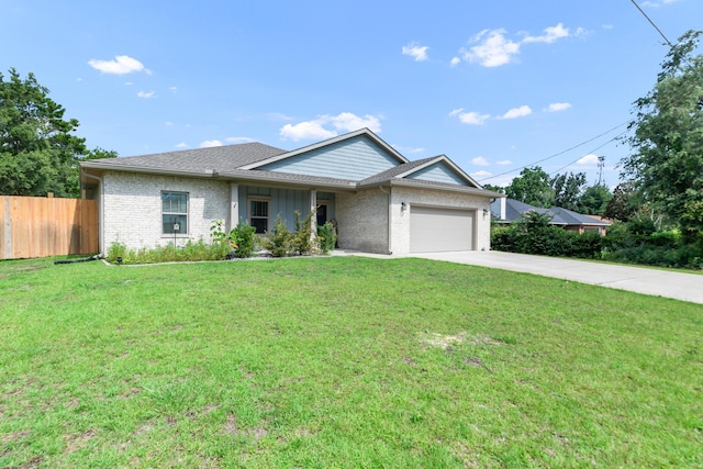 1922 Frontera St, Navarre, FL 32566 - single story home featuring concrete driveway, an attached garage, brick siding, and roof with shingles