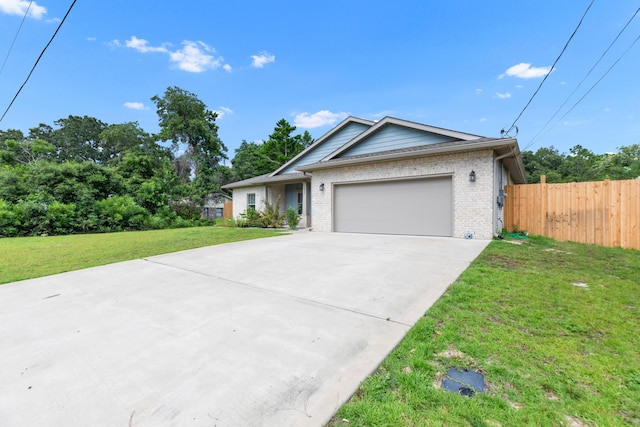 1922 Frontera St, Navarre, FL 32566 - ranch-style home with concrete driveway, a garage, and brick siding