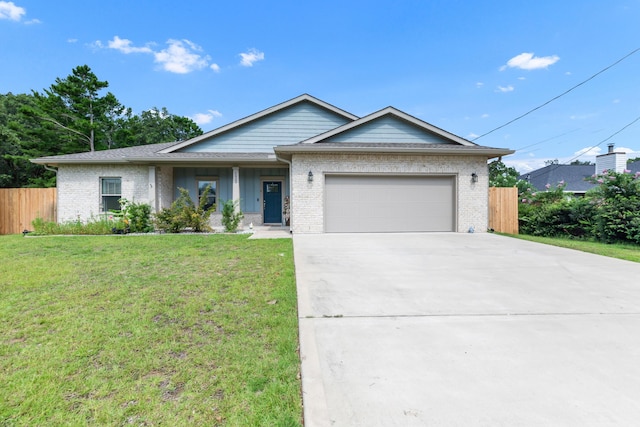 1922 Frontera St, Navarre, FL 32566 - single story home featuring a garage, concrete driveway, and brick siding