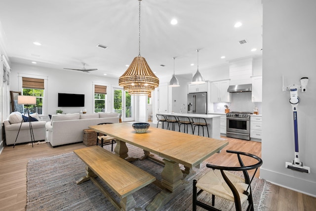 213 Spotted Dolphin Rd, Santa Rosa Beach, FL 32459 - dining area featuring light wood finished floors, recessed lighting, and a chandelier