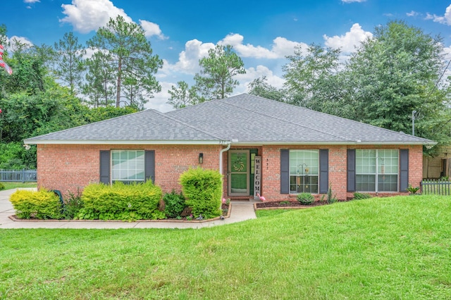 337 Peggy Dr, Crestview, FL 32536 - single story home with a shingled roof and brick siding
