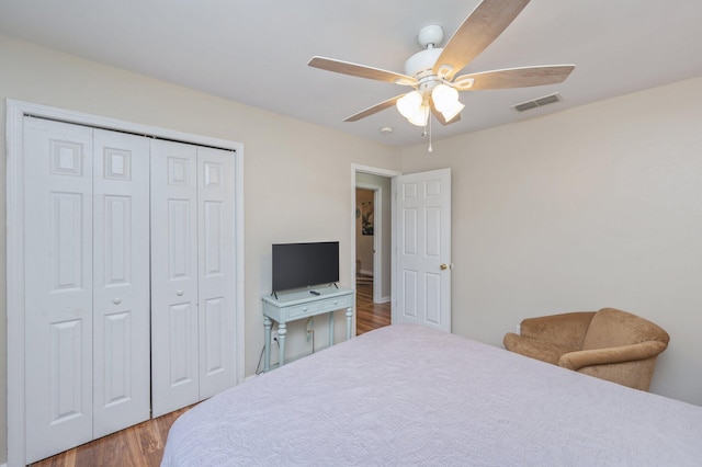 337 Peggy Dr, Crestview, FL 32536 - bedroom featuring wood finished floors, a closet, and ceiling fan