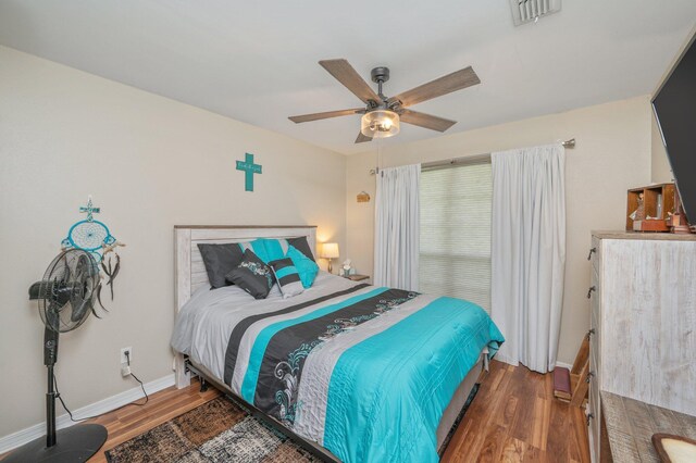 337 Peggy Dr, Crestview, FL 32536 - bedroom featuring wood finished floors and a ceiling fan