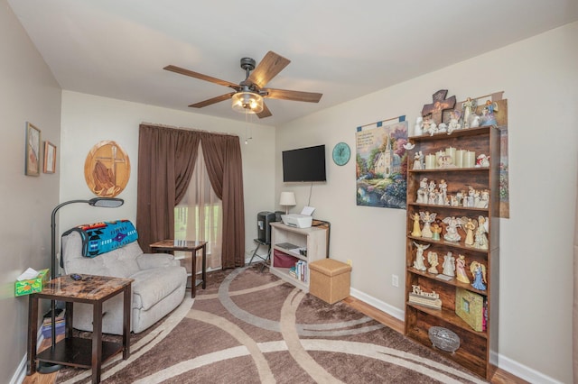 337 Peggy Dr, Crestview, FL 32536 - living area featuring a ceiling fan and baseboards