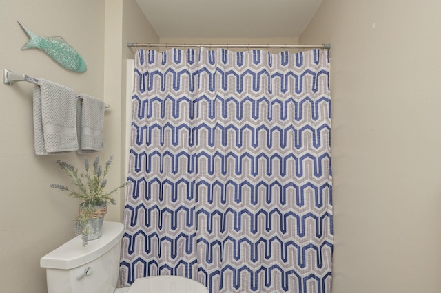 337 Peggy Dr, Crestview, FL 32536 - bathroom featuring toilet and a shower with curtain