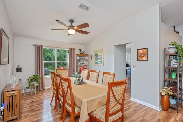337 Peggy Dr, Crestview, FL 32536 - dining space with vaulted ceiling, light wood-style floors, and ceiling fan