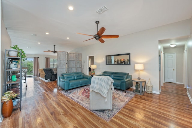 337 Peggy Dr, Crestview, FL 32536 - living room with ceiling fan, light wood finished floors, vaulted ceiling, and recessed lighting