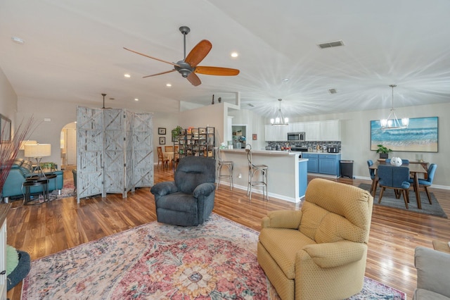 337 Peggy Dr, Crestview, FL 32536 - living room featuring wood finished floors, ceiling fan, recessed lighting, and arched walkways
