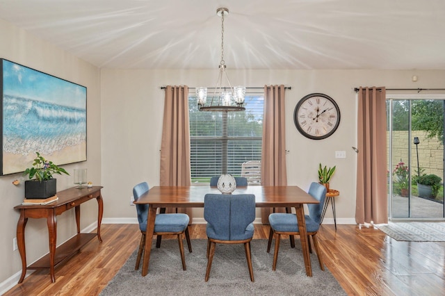337 Peggy Dr, Crestview, FL 32536 - dining area with a chandelier and light wood-style floors
