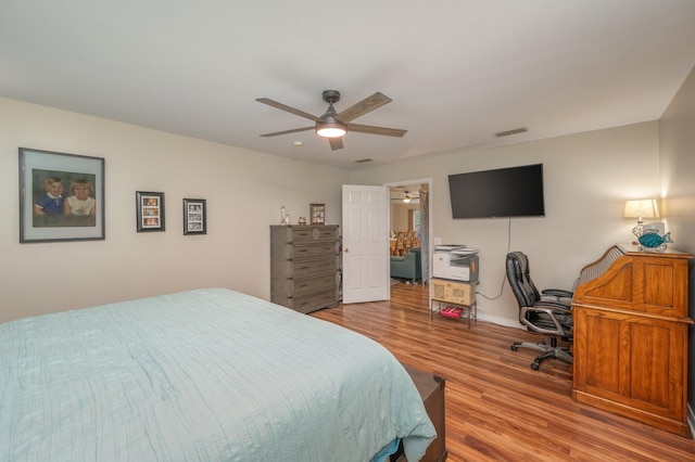 337 Peggy Dr, Crestview, FL 32536 - bedroom featuring wood finished floors, an office area, and a ceiling fan