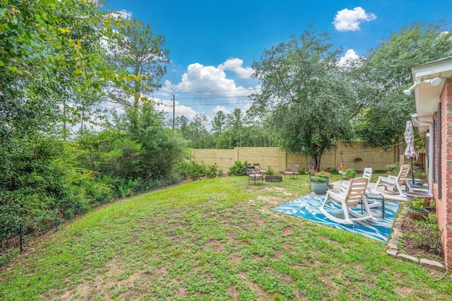 337 Peggy Dr, Crestview, FL 32536 - fenced backyard featuring a patio area