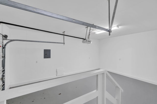 69 Lake Pointe Dr, Santa Rosa Beach, FL 32459 - garage with electric panel and a garage door opener