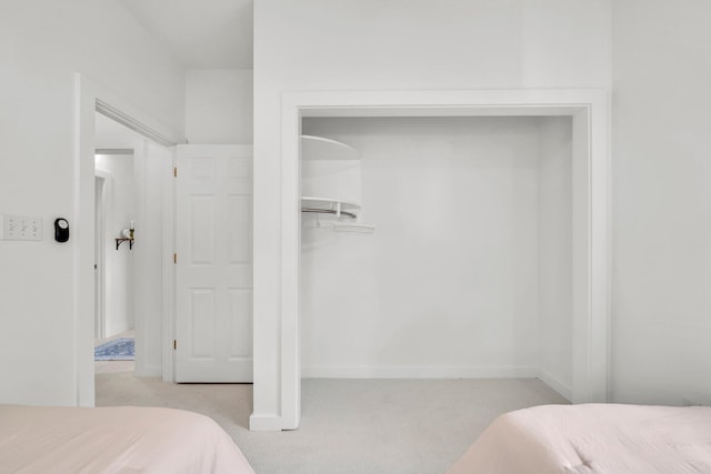 69 Lake Pointe Dr, Santa Rosa Beach, FL 32459 - bedroom featuring light colored carpet and a closet