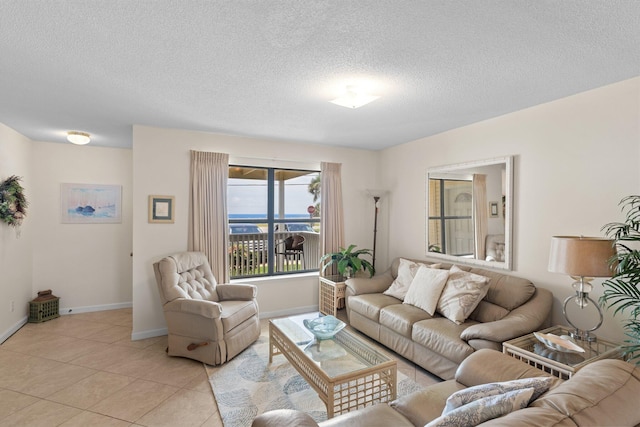3705 E Old Highway 98 # 6, Destin, FL 32541 - living area with a textured ceiling and light tile patterned floors