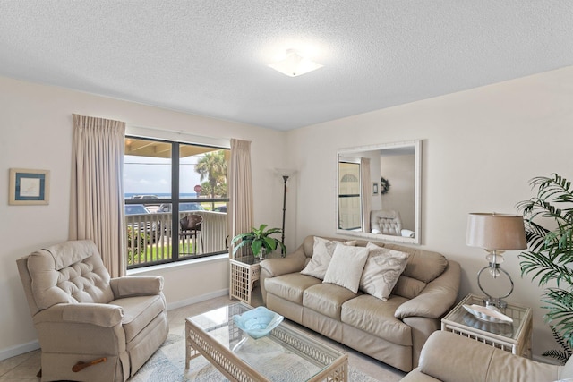 3705 E Old Highway 98 # 6, Destin, FL 32541 - living room with baseboards and a textured ceiling
