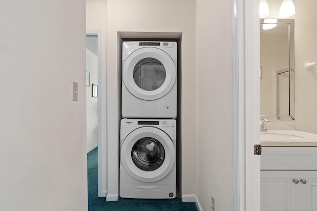 3705 E Old Highway 98 # 6, Destin, FL 32541 - laundry area with stacked washing machine and dryer and carpet floors