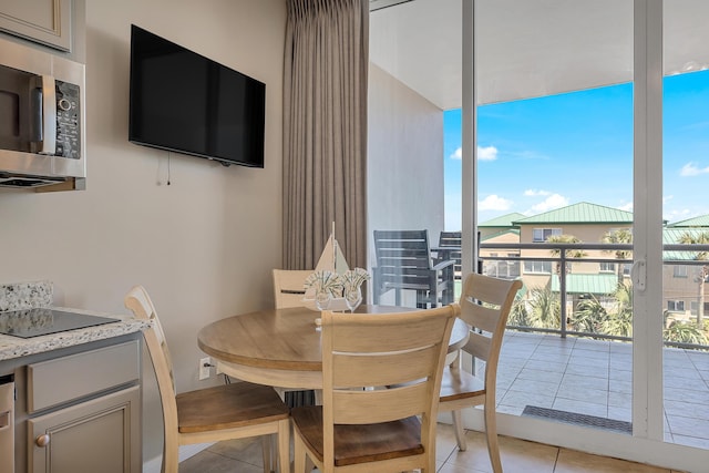 1517 SW Miracle Strip Pkwy Unit 309, Fort Walton Beach, FL 32548 - dining space featuring light tile patterned floors