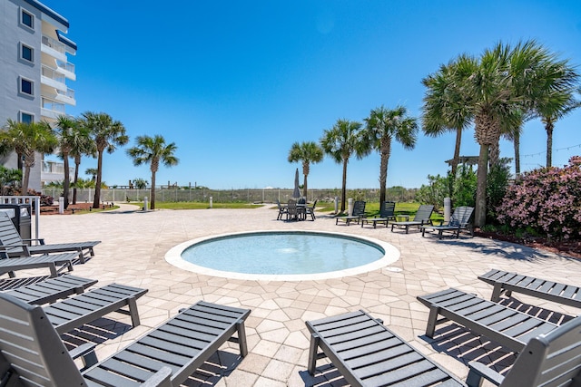 1517 SW Miracle Strip Pkwy Unit 309, Fort Walton Beach, FL 32548 - view of pool featuring a pool and a patio