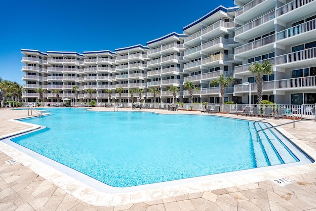 1517 SW Miracle Strip Pkwy Unit 309, Fort Walton Beach, FL 32548 - community pool featuring a patio