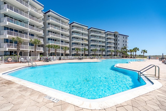 1517 SW Miracle Strip Pkwy Unit 309, Fort Walton Beach, FL 32548 - community pool with a patio