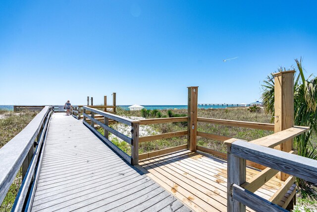 1517 SW Miracle Strip Pkwy Unit 309, Fort Walton Beach, FL 32548 - dock area with view of water and beach