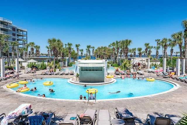 1517 SW Miracle Strip Pkwy Unit 309, Fort Walton Beach, FL 32548 - community pool featuring a patio area