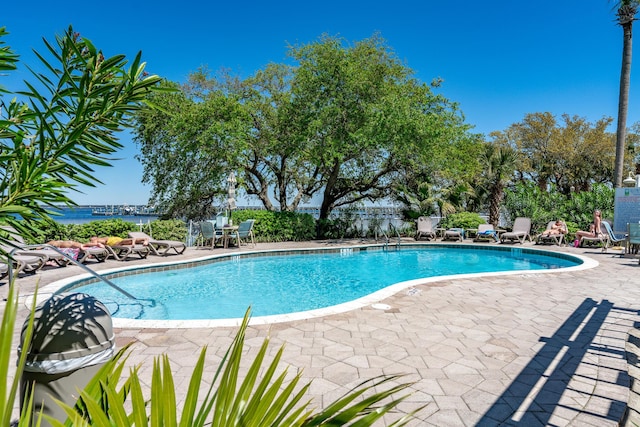 1517 SW Miracle Strip Pkwy Unit 309, Fort Walton Beach, FL 32548 - community pool featuring a patio