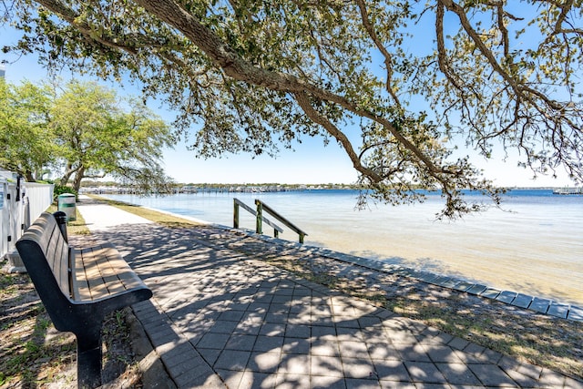 1517 SW Miracle Strip Pkwy Unit 309, Fort Walton Beach, FL 32548 - surrounding community featuring a water view and a boat dock