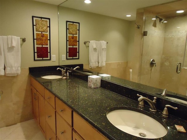 291 Scenic Gulf Dr Unit 1401, Miramar Beach, FL 32550 - full bath with double vanity, a shower stall, recessed lighting, and tile patterned flooring