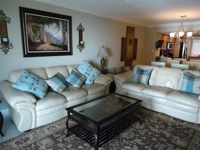 291 Scenic Gulf Dr Unit 1401, Miramar Beach, FL 32550 - living area featuring a chandelier and ornamental molding