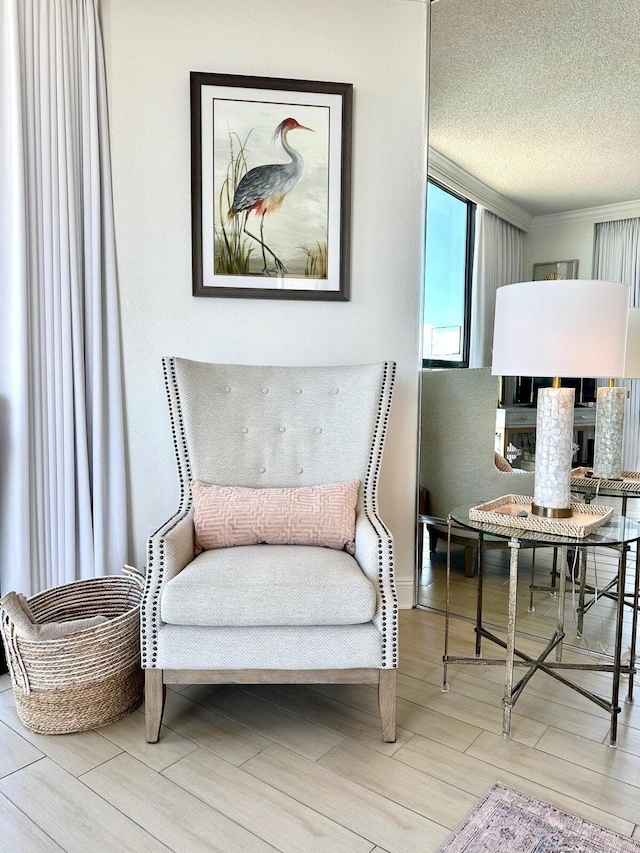 1096 Scenic Gulf Dr Unit 1512, Miramar Beach, FL 32550 - living area with wood finished floors and a textured ceiling