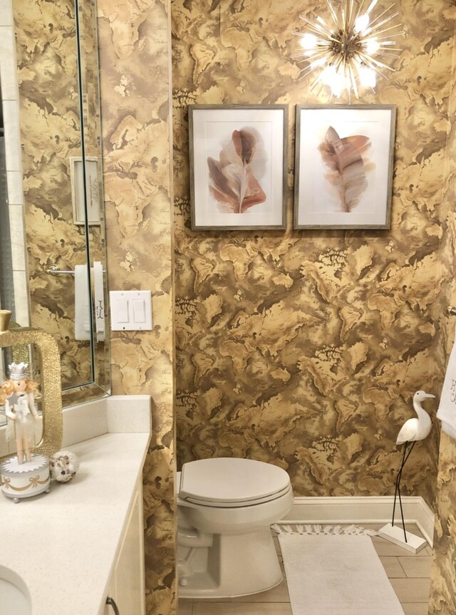 1096 Scenic Gulf Dr Unit 1512, Miramar Beach, FL 32550 - half bathroom with vanity, wallpapered walls, and tile patterned floors