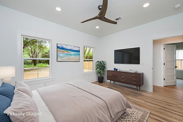 2940 Mccarty Ave, Crestview, FL 32539 - bedroom with recessed lighting, light wood-type flooring, and a ceiling fan