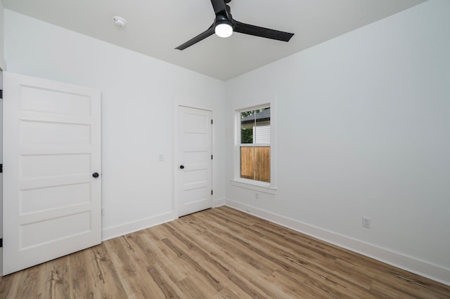 2940 Mccarty Ave, Crestview, FL 32539 - unfurnished room featuring light wood-style flooring, ceiling fan, and a smoke detector